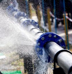 Water spraying from a pipeline valve